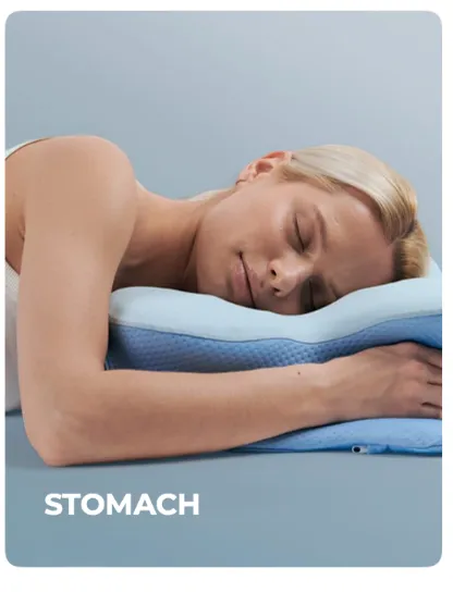 Stomach sleeping position on a contoured pillow